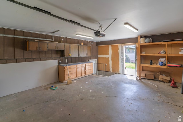 4740 S 3040 W, Taylorsville, UT 84129 - garage featuring a garage door opener