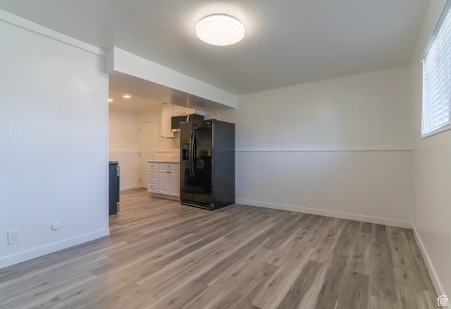 4740 S 3040 W, Taylorsville, UT 84129 - unfurnished room with light wood-type flooring and baseboards