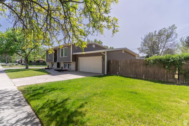 4740 S 3040 W, Taylorsville, UT 84129 - view of property exterior featuring driveway and a garage
