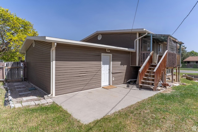 4740 S 3040 W, Taylorsville, UT 84129 - rear view of property with a patio area and stairs
