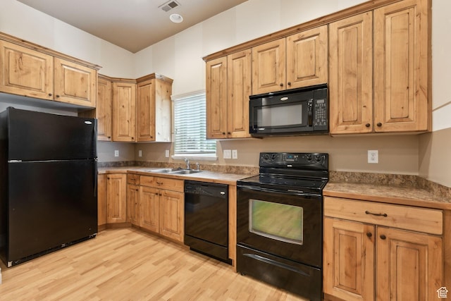 1737 S Kerrybrook Dr, Kaysville, UT 84037 - kitchen featuring black appliances, a sink, and light wood finished floors