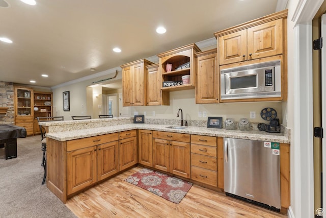 1737 S Kerrybrook Dr, Kaysville, UT 84037 - kitchen with stainless steel microwave, a sink, refrigerator, ornamental molding, and a peninsula