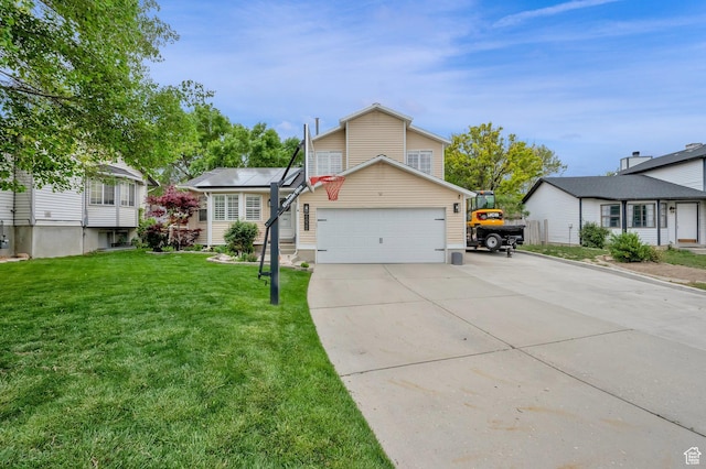 view of front of property featuring a front yard, driveway, and an attached garage