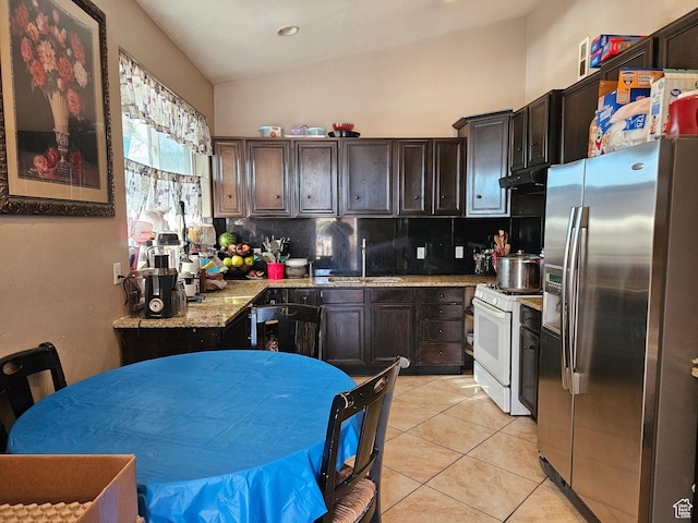 801 W Genesee Ave, Salt Lake City, UT 84104 - kitchen with stainless steel fridge with ice dispenser, white range with gas cooktop, a sink, decorative backsplash, and lofted ceiling