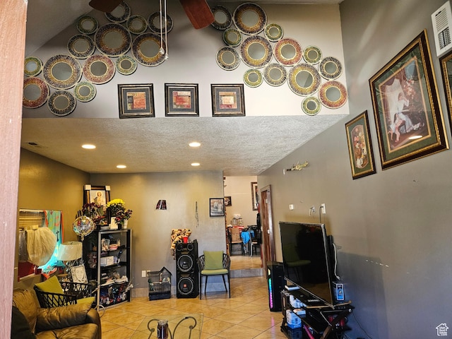 801 W Genesee Ave, Salt Lake City, UT 84104 - tiled living area featuring a textured ceiling and recessed lighting