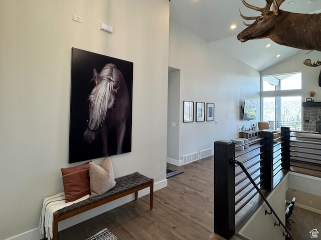 9351 E Acorn Cir Unit 921, Heber City, UT 84032 - hallway featuring high vaulted ceiling, wood finished floors, and recessed lighting