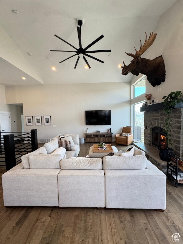 9351 E Acorn Cir Unit 921, Heber City, UT 84032 - living room with wood finished floors, high vaulted ceiling, ceiling fan, a stone fireplace, and recessed lighting