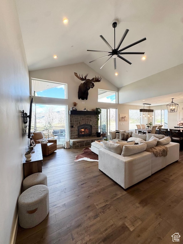9351 E Acorn Cir Unit 921, Heber City, UT 84032 - living area with a fireplace, dark wood finished floors, high vaulted ceiling, and plenty of natural light