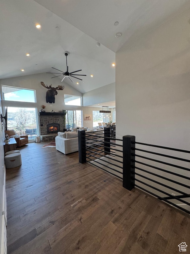 9351 E Acorn Cir Unit 921, Heber City, UT 84032 - living area with ceiling fan, dark wood finished floors, a lit fireplace, high vaulted ceiling, and recessed lighting