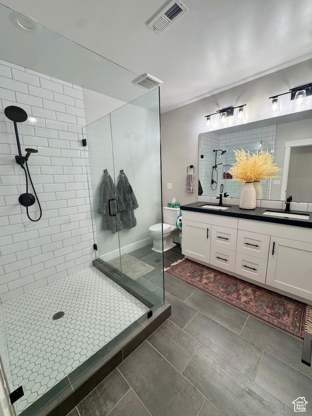 9351 E Acorn Cir Unit 921, Heber City, UT 84032 - full bathroom featuring a shower stall, double vanity, and tile patterned flooring