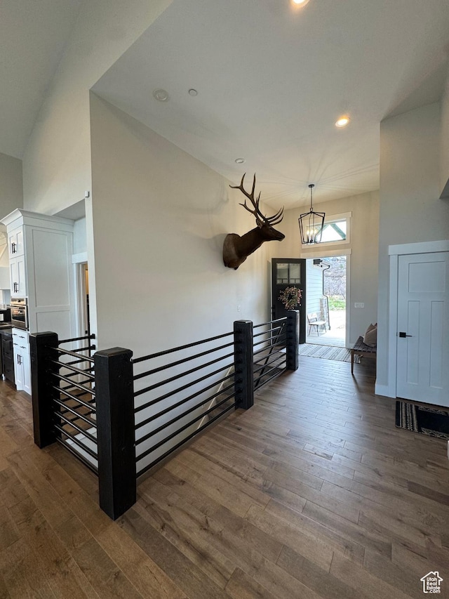 9351 E Acorn Cir Unit 921, Heber City, UT 84032 - hall with an upstairs landing, dark wood-style floors, a chandelier, and recessed lighting