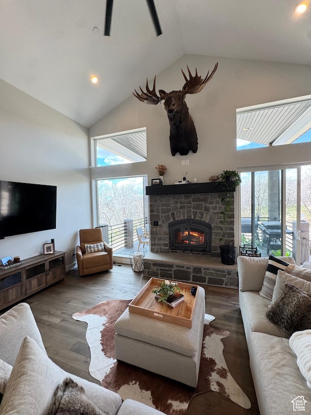 9351 E Acorn Cir Unit 921, Heber City, UT 84032 - living area featuring high vaulted ceiling, plenty of natural light, a stone fireplace, wood-type flooring, and recessed lighting