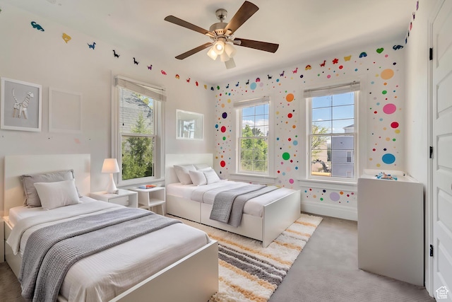 215 E 2nd Ave S, Salt Lake City, UT 84103 - bedroom with light colored carpet and a ceiling fan