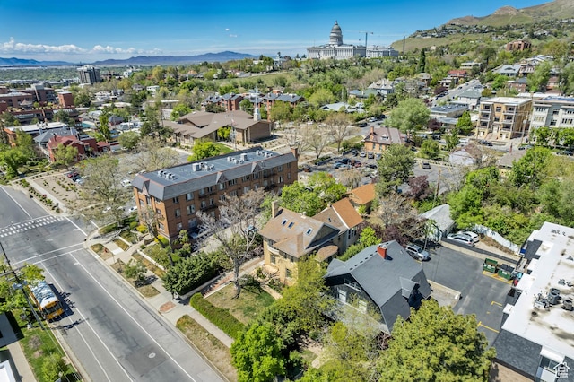 215 E 2nd Ave S, Salt Lake City, UT 84103 - aerial view of property and surrounding area featuring a mountainous background and nearby suburban area