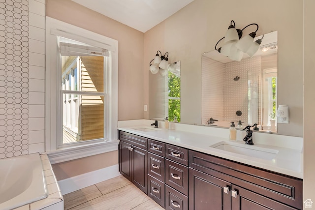 215 E 2nd Ave S, Salt Lake City, UT 84103 - full bath with tiled shower, a bathtub, double vanity, and baseboards