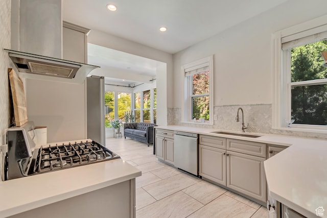 215 E 2nd Ave S, Salt Lake City, UT 84103 - kitchen with stainless steel dishwasher, a sink, plenty of natural light, light countertops, and recessed lighting
