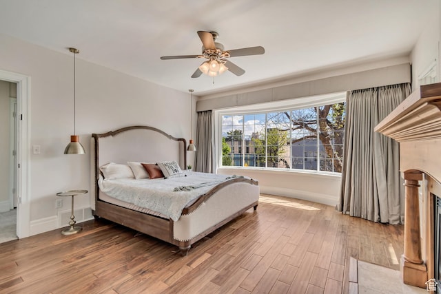 215 E 2nd Ave S, Salt Lake City, UT 84103 - bedroom featuring wood finished floors, baseboards, and a ceiling fan