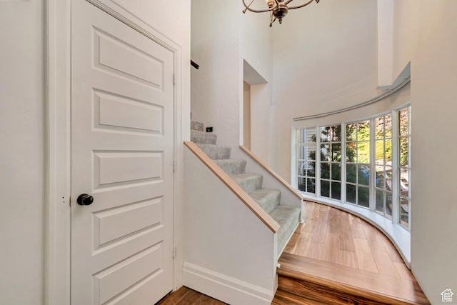 215 E 2nd Ave S, Salt Lake City, UT 84103 - stairs featuring a chandelier and wood finished floors