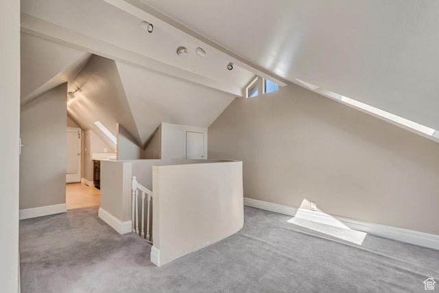 215 E 2nd Ave S, Salt Lake City, UT 84103 - bonus room with lofted ceiling, light carpet, and baseboards