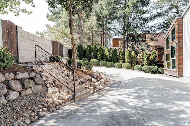 view of property's community with fence