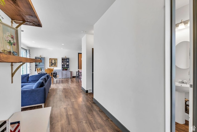 11386 S New Bern Way S, Jordan, UT 84009 - hall featuring dark wood-style floors, recessed lighting, and baseboards