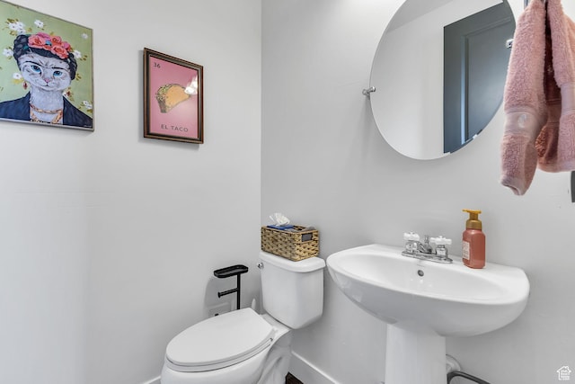 11386 S New Bern Way S, Jordan, UT 84009 - half bath with baseboards, toilet, and a sink