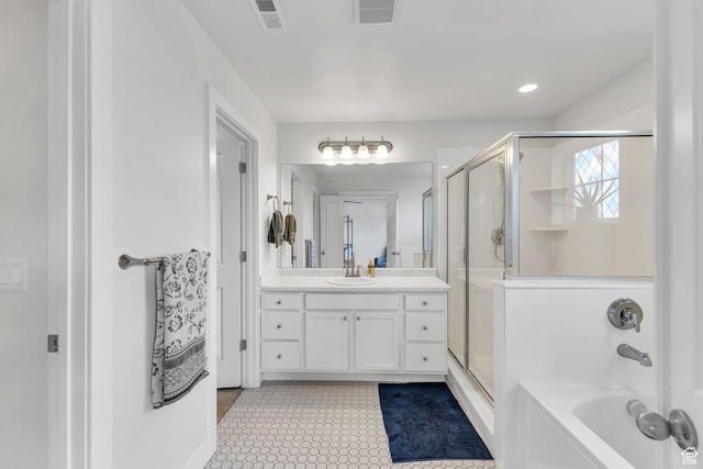 11386 S New Bern Way S, Jordan, UT 84009 - full bath with a shower stall, vanity, a tub, and tile patterned floors