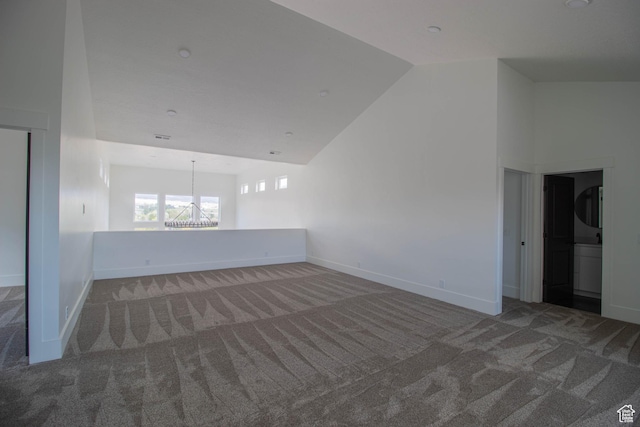 479 S 550 E, Wallsburg, UT 84082 - empty room with a chandelier, carpet floors, baseboards, and vaulted ceiling