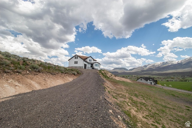 479 S 550 E, Wallsburg, UT 84082 - view of dirt / gravel driveway featuring a mountain view and a view of rural / pastoral area
