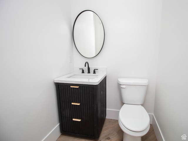 479 S 550 E, Wallsburg, UT 84082 - half bathroom with wood finished floors, vanity, toilet, and baseboards