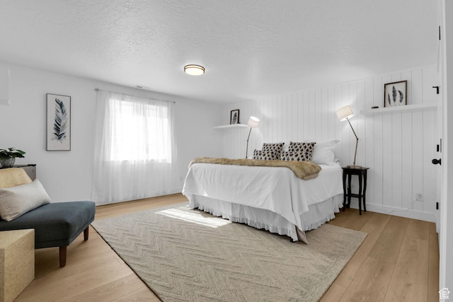 1441 N Jerry Gertsch Ln, Midway, UT 84049 - bedroom featuring light wood-style flooring and a textured ceiling