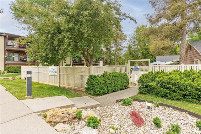 view of yard featuring a gate and fence