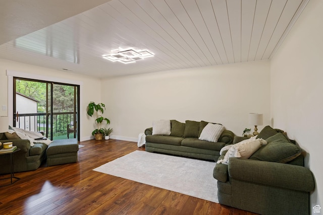 living room with wood finished floors and baseboards