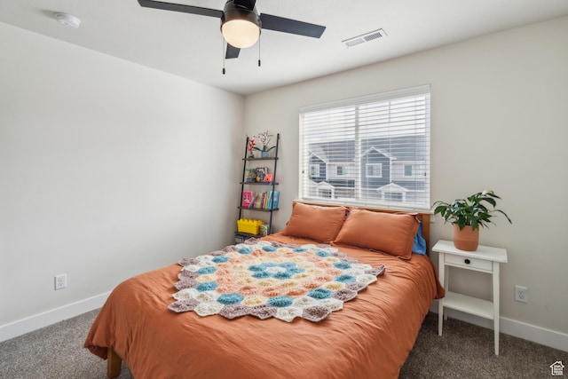bedroom featuring carpet floors, baseboards, and a ceiling fan
