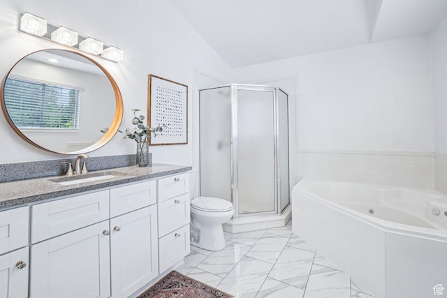 full bathroom with a stall shower, vanity, a jetted tub, toilet, and marble look tiles