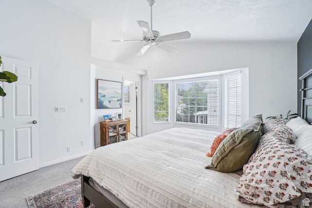 carpeted bedroom featuring a ceiling fan, high vaulted ceiling, and baseboards