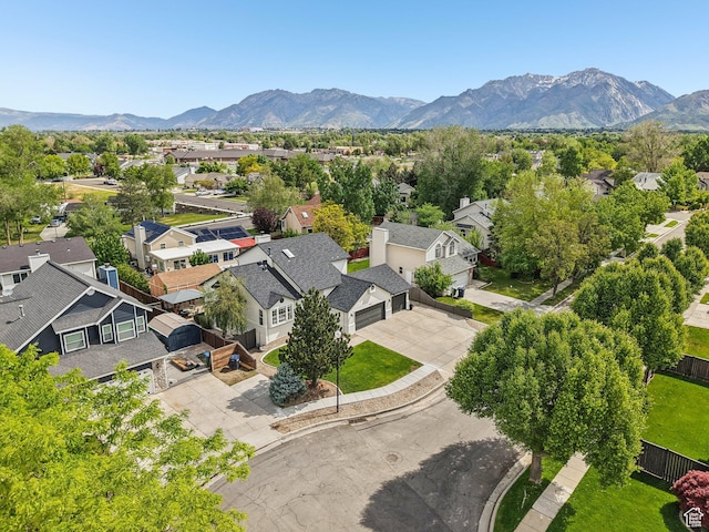 aerial perspective of suburban area featuring a mountainous background