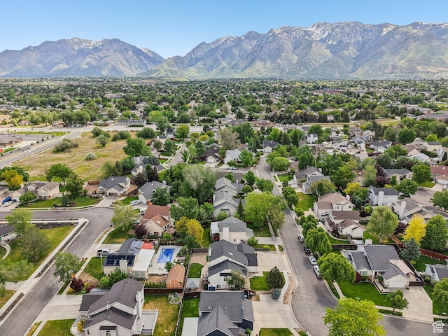 aerial perspective of suburban area with a mountain backdrop