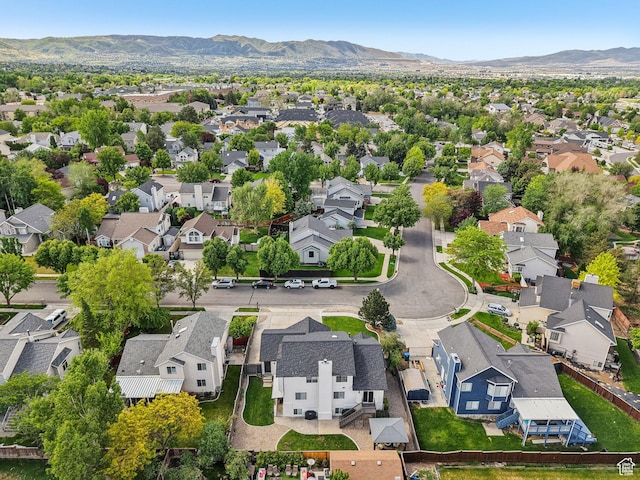 aerial perspective of suburban area with a mountain backdrop