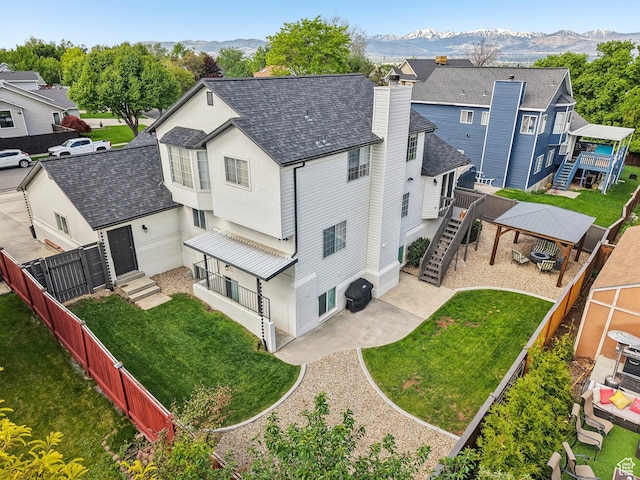 aerial perspective of suburban area with a mountain backdrop