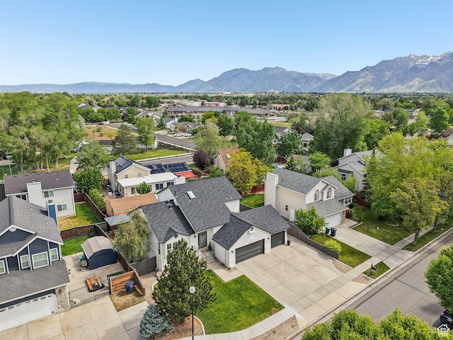 aerial perspective of suburban area featuring a mountainous background