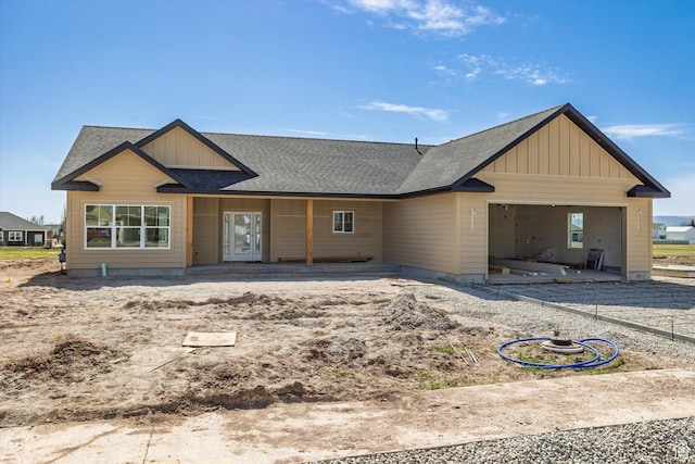 560 Eagle Dr, Preston, ID 83263 - view of front of house featuring board and batten siding, a garage, and a shingled roof