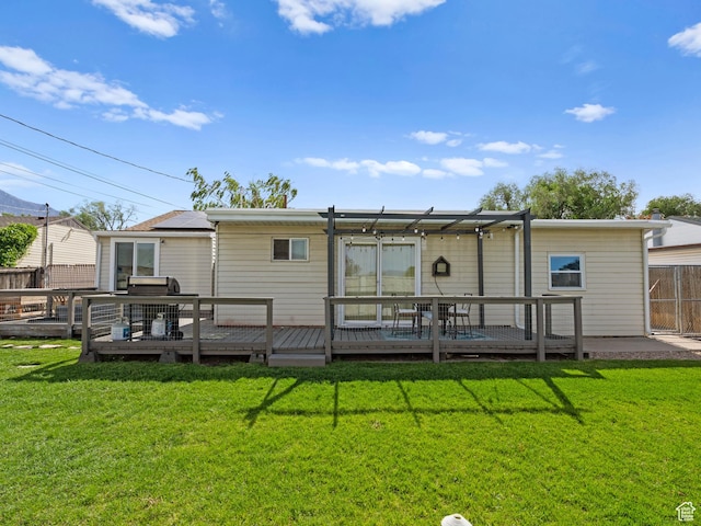 rear view of property with a wooden deck