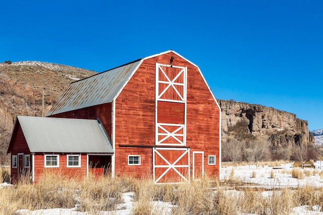 view of barn with a mountain view
