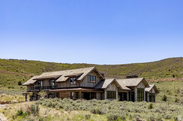view of front of house with a mountain view and board and batten siding