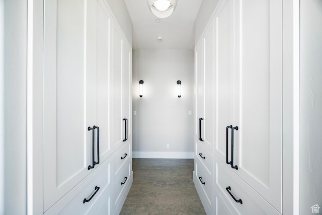 corridor featuring baseboards