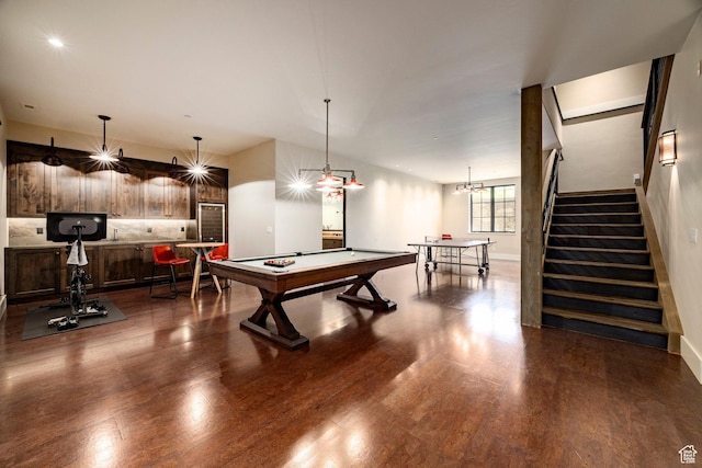 playroom featuring dark wood-style floors, billiards table, and baseboards