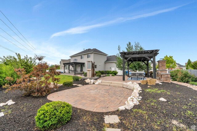 3106 N Eagle Way, Lehi, UT 84043 - rear view of house featuring a pergola, a patio, and stucco siding