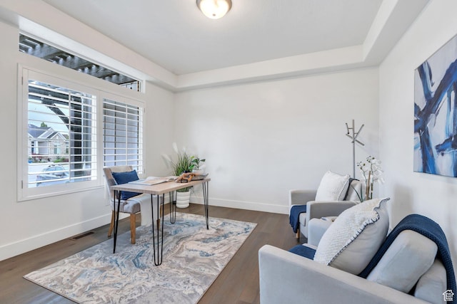 office area featuring wood finished floors and baseboards