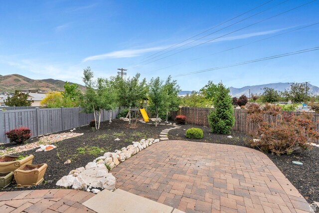 3106 N Eagle Way, Lehi, UT 84043 - view of patio with a mountain view and a fenced backyard